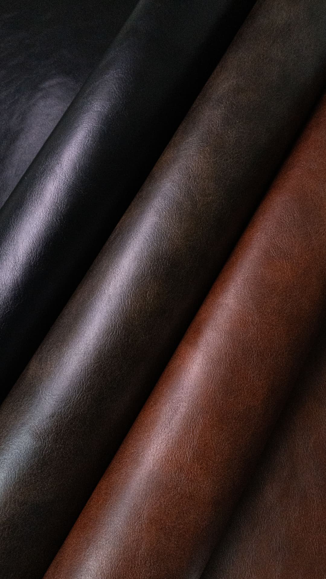 Macro detail of BANARIC™ banana-fibre plant-based leather alternative in warm tan