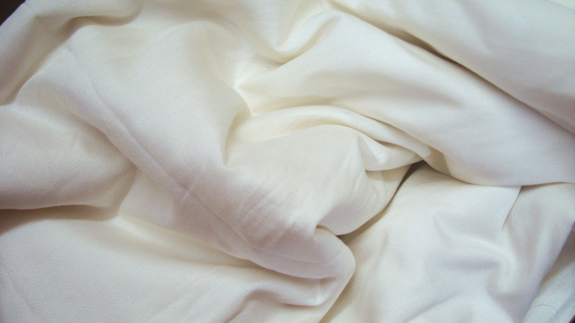 Woven banana fibre fabric from the BANARIC-TEX™ textile platform, draped in folds