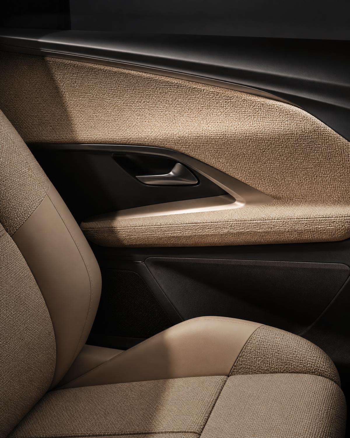 Car interior door panel and seat finished in natural fibre based material